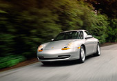 AUT 29 RK0140 04
1999 Porsche 911 Carrera Coupe Silver 3/4 Front View On Road In Motion