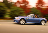 AUT 29 RK0169 01
1999 BMW M Roadster Z3 Convertible Blue Profile View On Road In Motion