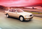 AUT 29 RK0267 03
1999 Lexus LS400 Champagne Side 3/4 View On Road In Motion