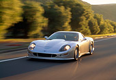 AUT 29 RK0281 01
1998 Chevrolet Callaway C12 Silver 3/4 Front View On Road In Motion By Trees