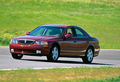 AUT 29 RK0316 01
2000 Lincoln LS Sport Sedan Burgundy 3/4 Front View On Road By Grass