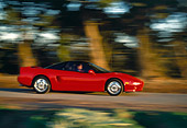 AUT 29 RK0395 03
1991 Acura NSX Red Profile View On Road In Motion
