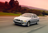 AUT 29 RK0516 01
2000 BMW M5 Light Blue 3/4 Front View On Road In Motion