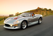 AUT 29 RK0568 04
1999 Shelby Series 1 Convertible Silver 3/4 Front View On Road In Motion