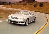 AUT 29 RK0630 27
2003 Mercedes-Benz SL55 AMG Roadster Silver 3/4 Front View On Road In Motion Filtered