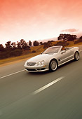 AUT 29 RK0630 28
2003 Mercedes-Benz SL55 AMG Roadster Silver 3/4 Front View On Road In Motion Filtered