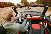 AUT 29 RK0786 01
2005 Mini Cooper Convertible Orange In Motion With Driver