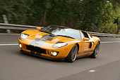 AUT 29 RK1112 01
2006 Ford GTX1 Yellow And Silver 3/4 Front View On Road In Motion