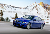 AUT 29 RK1461 01
2008 BMW M3 Coupe Blue In Motion On Road By Snowy Mountains