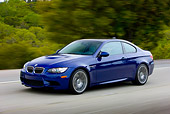 AUT 29 RK1462 01
2008 BMW M3 Coupe Blue In Motion On Road By Trees
