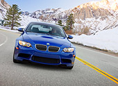 AUT 29 RK1464 01
2008 BMW M3 Coupe Blue In Motion On Road By Snowy Mountains