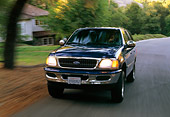 AUT 29 RK0005 06
1997 Ford Expedition Blue Front 3/4 View On Road In Motion