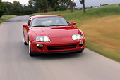 AUT 29 RK0035 01
1997 Toyota Supra 15th Anniversary Edition Red 3/4 Front View On Road In Motion