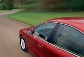 AUT 29 RK0038 08
1998 Mercury Sable Red Overhead 3/4 Rear View Detail On Road In Motion