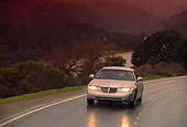 AUT 29 RK0081 03
1998 Lincoln Town Car Silver 3/4 Front View On Road In Motion