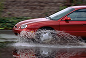 AUT 29 RK0119 01
1998 Ford Taurus GL Red Profile Splashing Water In Motion