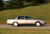 AUT 29 RK0128 01
1998 Cadillac De Ville Champagne Profile View On Road In Motion