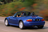AUT 29 RK0163 12
1999 BMW M Roadster Z3 Convertible Blue 3/4 Rear View On Road In Motion
