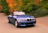 AUT 29 RK0177 02
1999 BMW M Roadster Z3 Convertible 3/4 Front View On Road By Trees