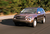 AUT 29 RK0195 06
1999 Lexus RX300 3/4 Front View On Road In Motion Blurry Trees