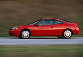AUT 29 RK0213 08
1999 Mercury Cougar V6 Red Profile View On Road In Motion