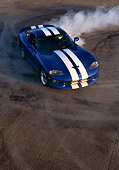 AUT 29 RK0330 18
1997 Dodge Viper Blue White Stripe Overhead Burning Tires On Pavement