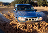 AUT 29 RK0392 14
1996 Ford Explorer Blue Head On View In Muddy Water