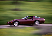 AUT 29 RK0396 05
1993 Chevrolet Corvette Burgundy Profile Shot On Road In Motion