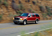 AUT 29 RK0418 01
2000 Ford Excursion Red 3/4 View On Road In Motion