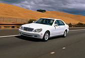 AUT 29 RK0429 01
2000 Mercedes-Benz 500S White 3/4 Side View On Road In Motion