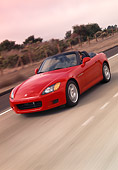 AUT 29 RK0450 01
2000 Honda S2000 Convertible Red Slanted 3/4 Front View On Road In Motion