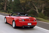 AUT 29 RK0452 07
2000 Honda S2000 Convertible Red 3/4 Rear View On Road In Motion