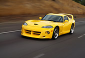 AUT 29 RK0477 23
1996 Dodge Hennessey Viper Venom 650R Yellow 3/4 Front View On Road In Motin