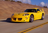 AUT 29 RK0478 03
1996 Dodge Hennessey Viper Venom 650R Yellow 3/4 Front In Motion On Road