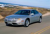 AUT 29 RK0486 08
2001 Oldsmobile Aurora V8 Silver 3/4 Front View On Road By Ocean