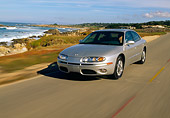 AUT 29 RK0486 34
2001 Oldsmobile Aurora V8 Silver 3/4 Front View On Road By Ocean