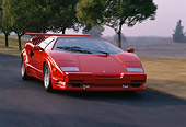 AUT 29 RK0524 15
1989 Lamborghini 25th Anniversary Edition Red 3/4 Front View On Road In Motion