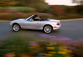 AUT 29 RK0571 17
2001 Mazda Miata Convertible Silver 3/4 Rear View On Road In Motion