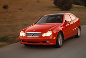 AUT 29 RK0593 11
2002 Mercedes-Benz C230 Kompressor Red 3/4 Front View On Road In Motion
