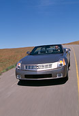 AUT 29 RK0599 07
2004 Cadillac XLR Convertible Silver 3/4 Front View On Road In Motion