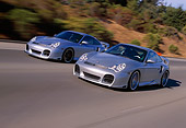 AUT 29 RK0654 09
2004 Porsche X50 2002 996 Turbo Silver 3/4 Front View On Road In Motion