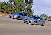 AUT 29 RK0654 26
2004 Porsche X50 2002 996 Turbo Silver 3/4 Front View On Road In Motion