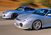 AUT 29 RK0654 32
2004 Porsche X50 2002 996 Turbo Silver 3/4 Front View On Road In Motion
