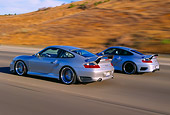 AUT 29 RK0655 02
2004 Porsche X50 2002 996 Turbo Silver 3/4 Rear View On Road In Motion