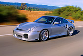 AUT 29 RK0656 08
2004 Porsche X50 Turbo Silver 3/4 Front View On Road In Motion