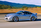 AUT 29 RK0657 05
2004 Porsche X50 Turbo Silver 3/4 Front View On Road In Motion