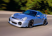 AUT 29 RK0659 01
2002 Porsche 996 Turbo Silver 3/4 Front View On Road In Motion