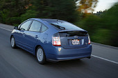 AUT 29 RK0874 01
2005 Toyota Prius Blue 3/4 Rear View On Road In Motion