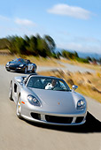 AUT 29 RK0877 01
2005 Porsche Boxster S Police Car Chasing 2005 Porsche Carerra GT Silver  On Road