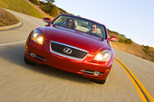 AUT 29 RK1011 01
2006 Lexus SC430 Convertible Red Slanted Head On Shot On Road In Motion